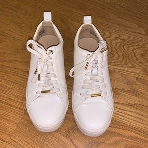 Size 8 white sneakers with gold detailing